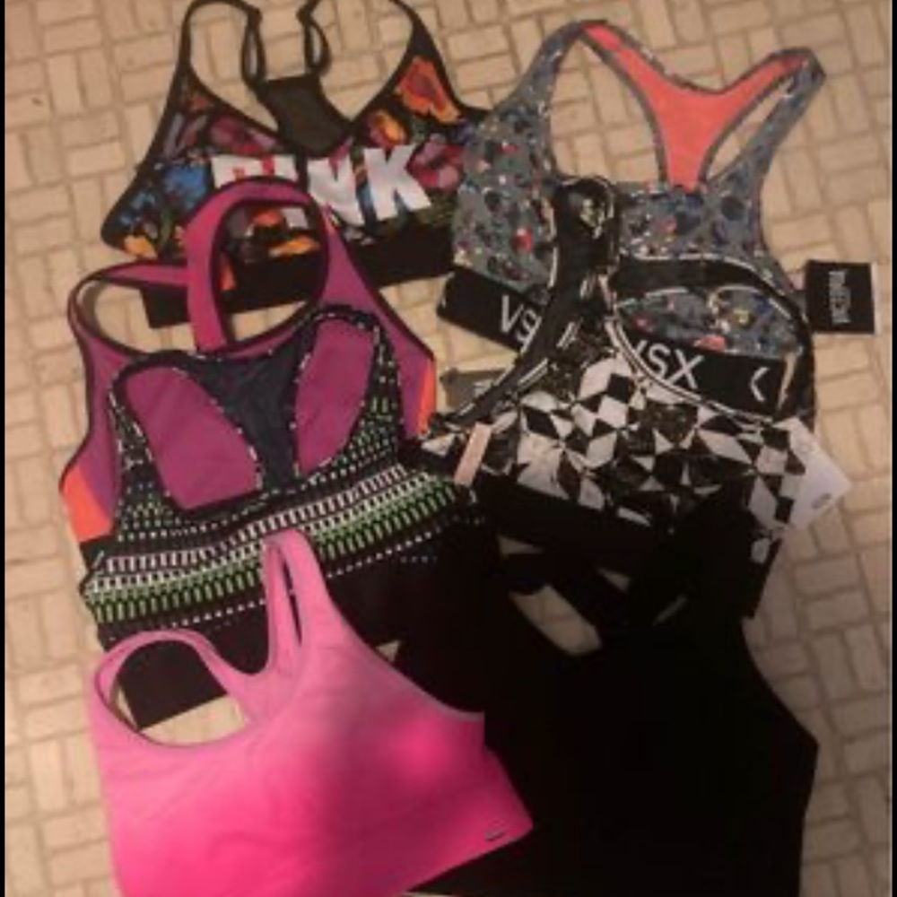 7 VICTORIA SECRET PINK SPORTS BRAS NWT AND TWO USED LIKE NEW